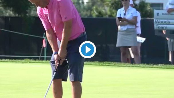 Tiger Woods' playing partner putts using his wedge